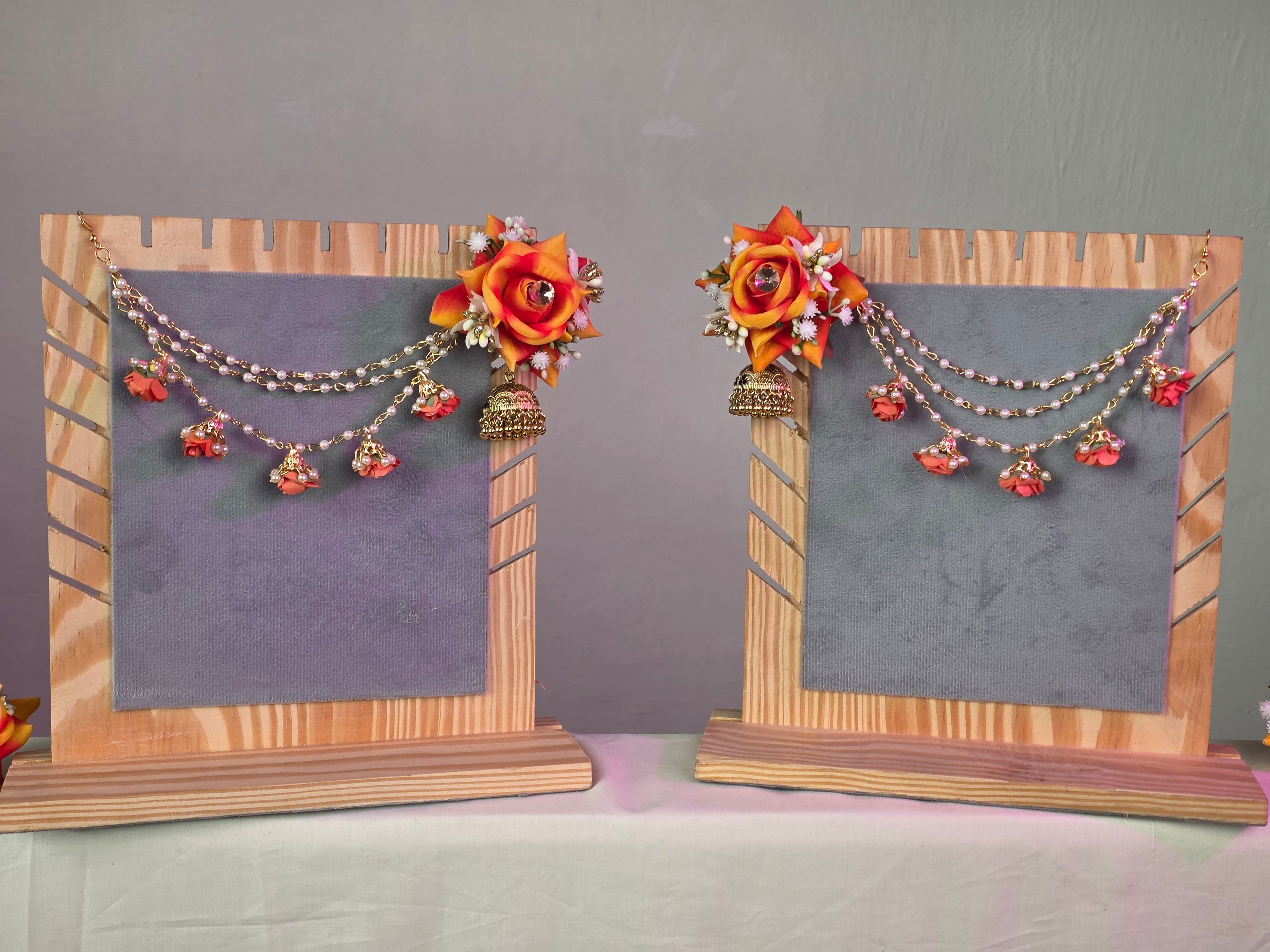 orange, rust colour artificial flower jewellery set for Pakistani weddings.
earings with sahary adn jhumka