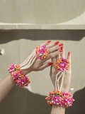 Flower bracelet with attached rings