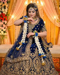 lue and Gold Majesty bridal floral jewelry set featuring premium royal blue artificial flowers and gold accents by De Fleuristes.