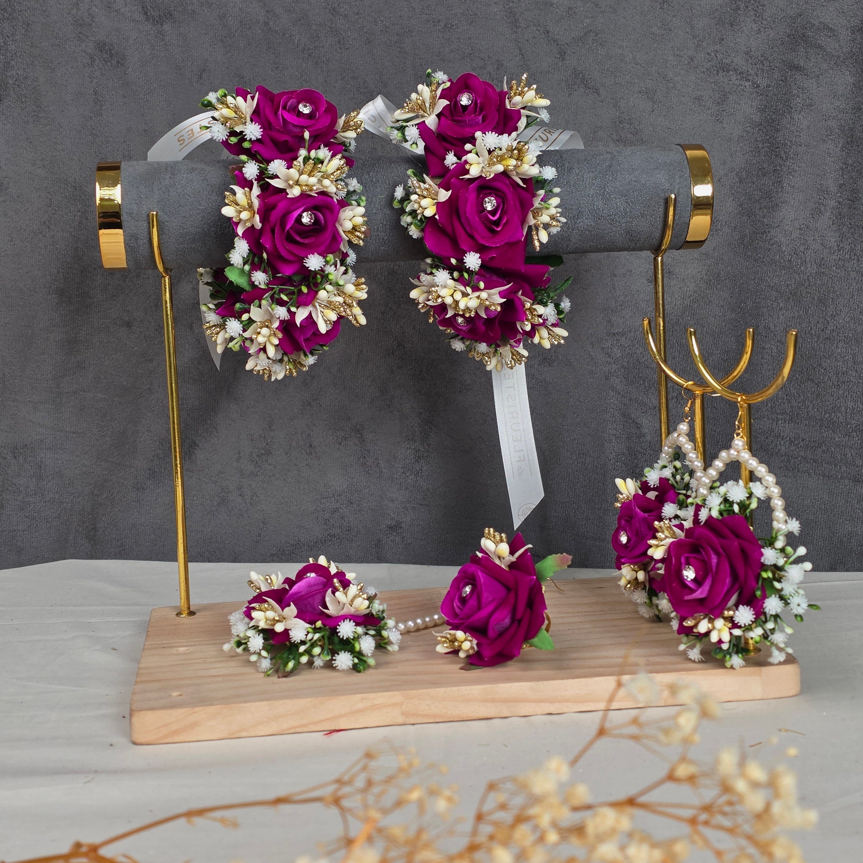 Close-up shot of the intricate artificial focal flowers and preserved dried botanicals on the Dark Sun jewelry set.