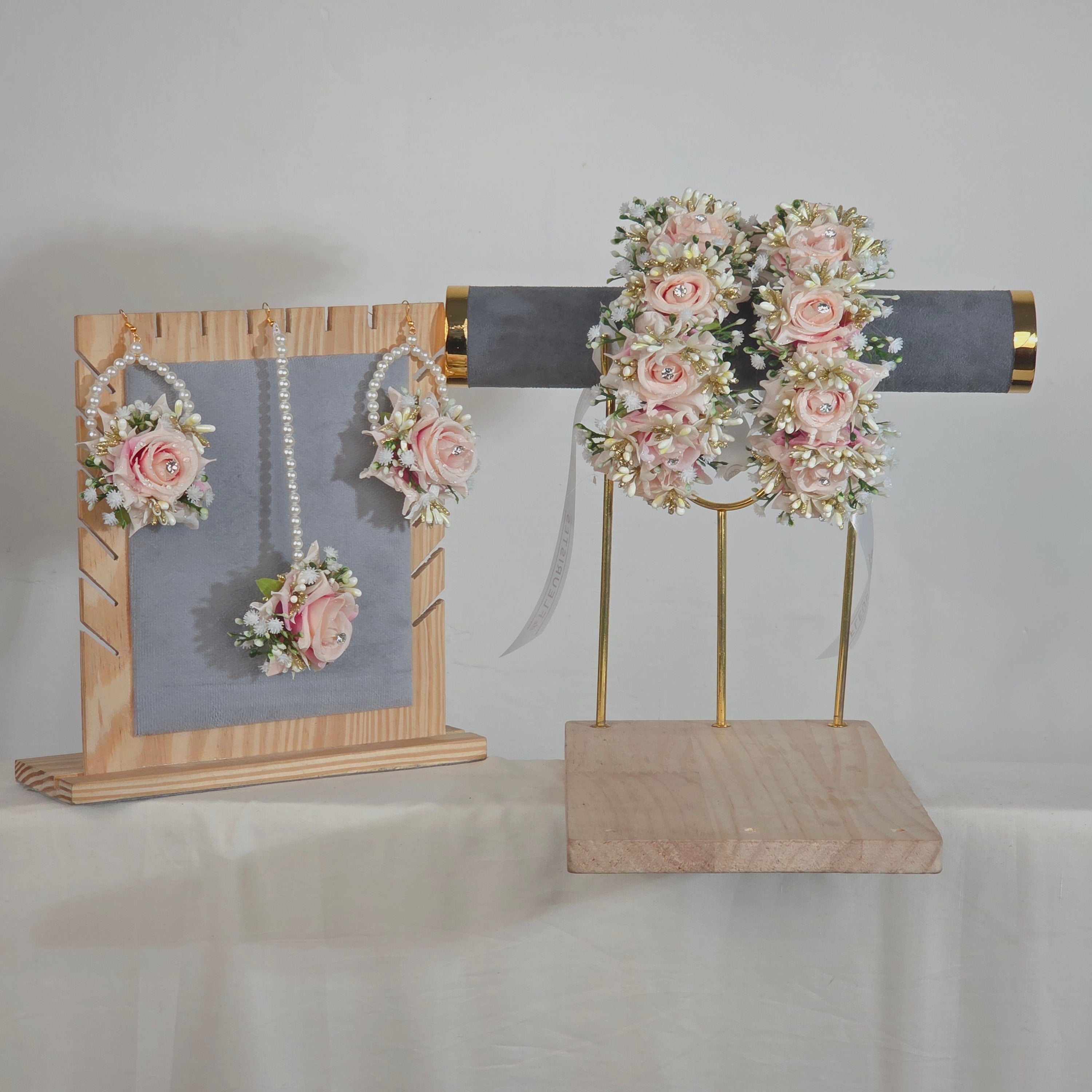 White and pink artificial  gajra pair worn by a mehndi bride. flowers jewelry set and gajra pair